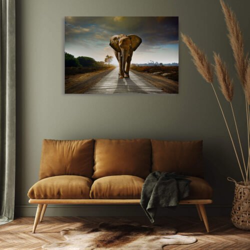 African Elephant - Animal Wall Art. Bring the majesty of the African savanna into your home with this inspiring wildlife wall art. Featuring a powerful elephant grazing peacefully, this canvas print captures the beauty and serenity of nature. Perfect for adding a touch of the wild to any space.