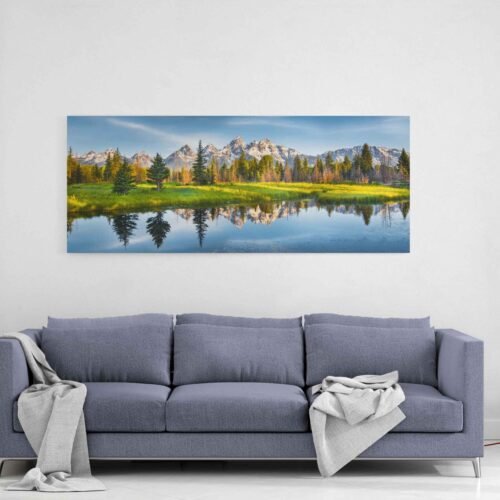 Peak Reflections - Majestic Panorama of Mount Moran in Grand Teton National Park - Panoramic Wall Art. Let the serene beauty and awe-inspiring grandeur of this scene grace your walls, creating an atmosphere of peace, wonder, and appreciation for the natural world.