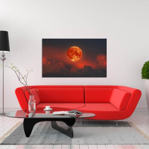 Crimson Eclipse - The Blood Moon in a Black Sky with Clouds - Astronomy Prints "Crimson Eclipse" celebrates the awe-inspiring beauty of celestial events and the profound sense of wonder they evoke. The striking contrast of the crimson-hued moon against the dark sky creates a captivating ambiance that enthralls the observer.