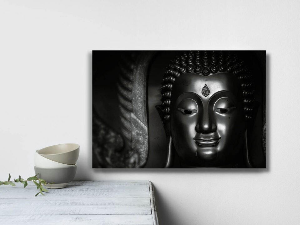 Serenity in Darkness - Black Mat Buddha Statue in Thailand - Spiritual Wall Art Hang this canvas print in your meditation space, living room, or any area where you seek to create a serene and contemplative atmosphere. It becomes a captivating focal point that encourages quiet reflection and invites you to embrace moments of stillness and mindfulness.