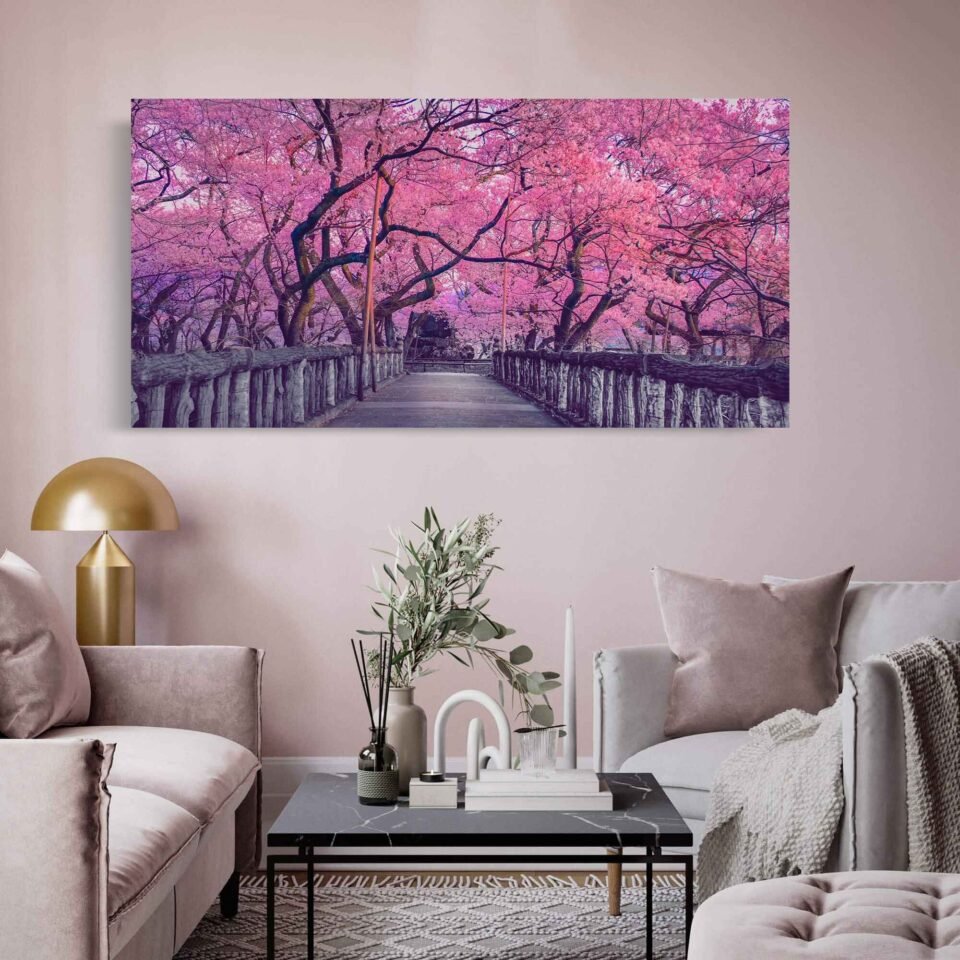 Blossoms of Tranquility Floral Wall Art Prints - Pink Cherry Trees Blooming, Beautiful Scenery of Japanese Countryside. The lush pink blossoms of the cherry trees create a breathtaking spectacle against the backdrop of the wooden bridge, evoking a sense of tranquility and natural harmony. The vivid colors, intricate textures, and serene composition are faithfully preserved, allowing you to immerse yourself in the captivating beauty of the scene.